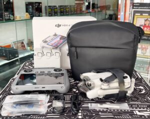 DJI Mini 4 Pro Fly More Combo with K&F ND filters, RC 2 controller, and 64GB memory card – excellent condition