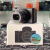 Sony ZV-1M2 vlogging camera with 18-50mm zoom lens and flip screen – like new condition