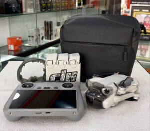 DJI Mini 4 Pro Fly More Combo with RC 2 controller, 3 batteries, and 128GB memory card – excellent condition